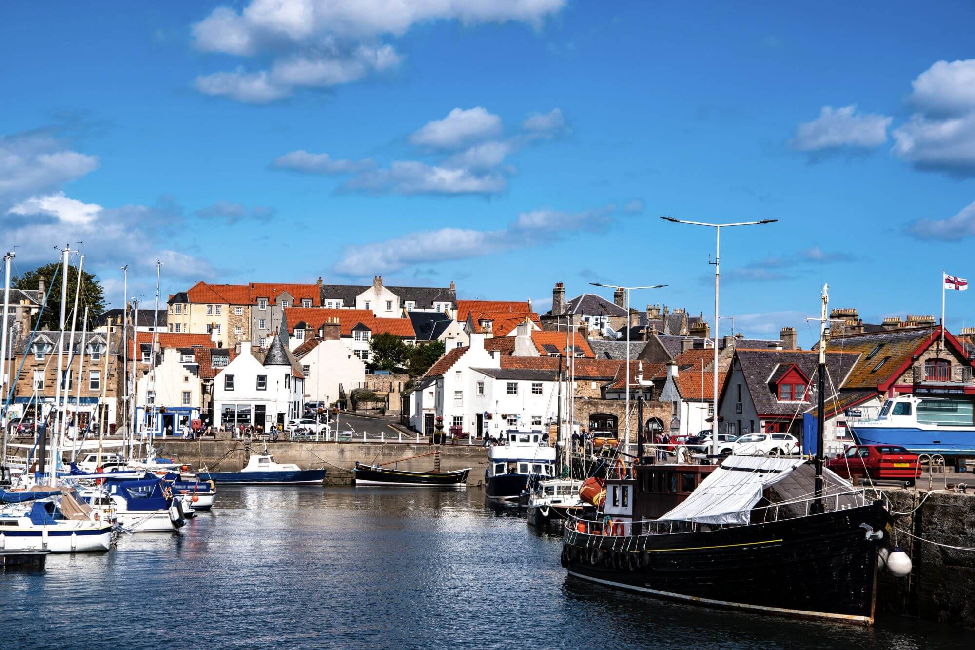 View of the harbor with boats and yachts in Anstruther village, Fife.