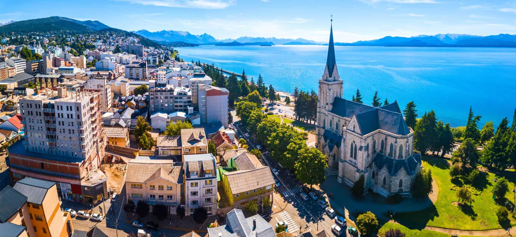 Bariloche in Argentina - a pretty town street by the water on a sunny day