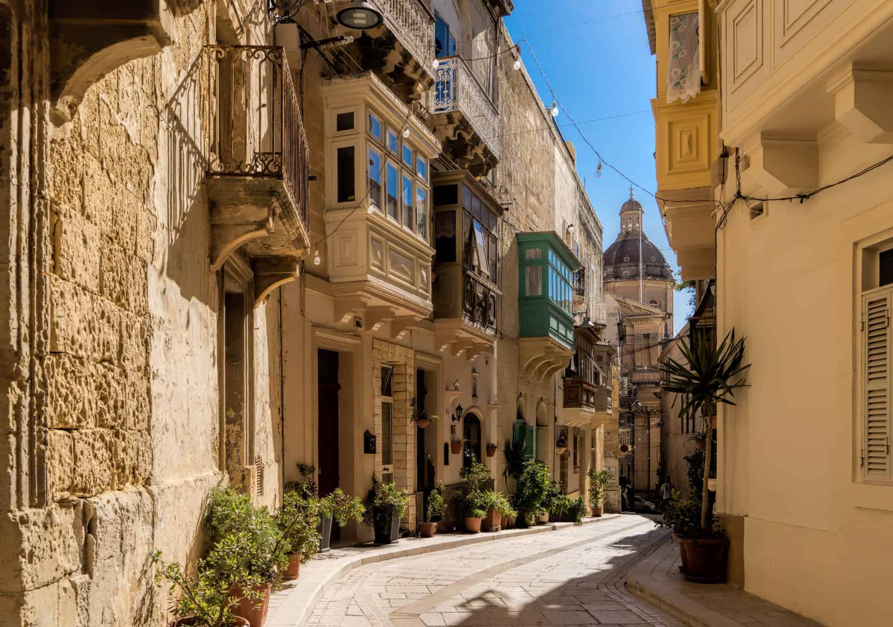 Cozy streets of Maltese towns adorned with traditional houses
