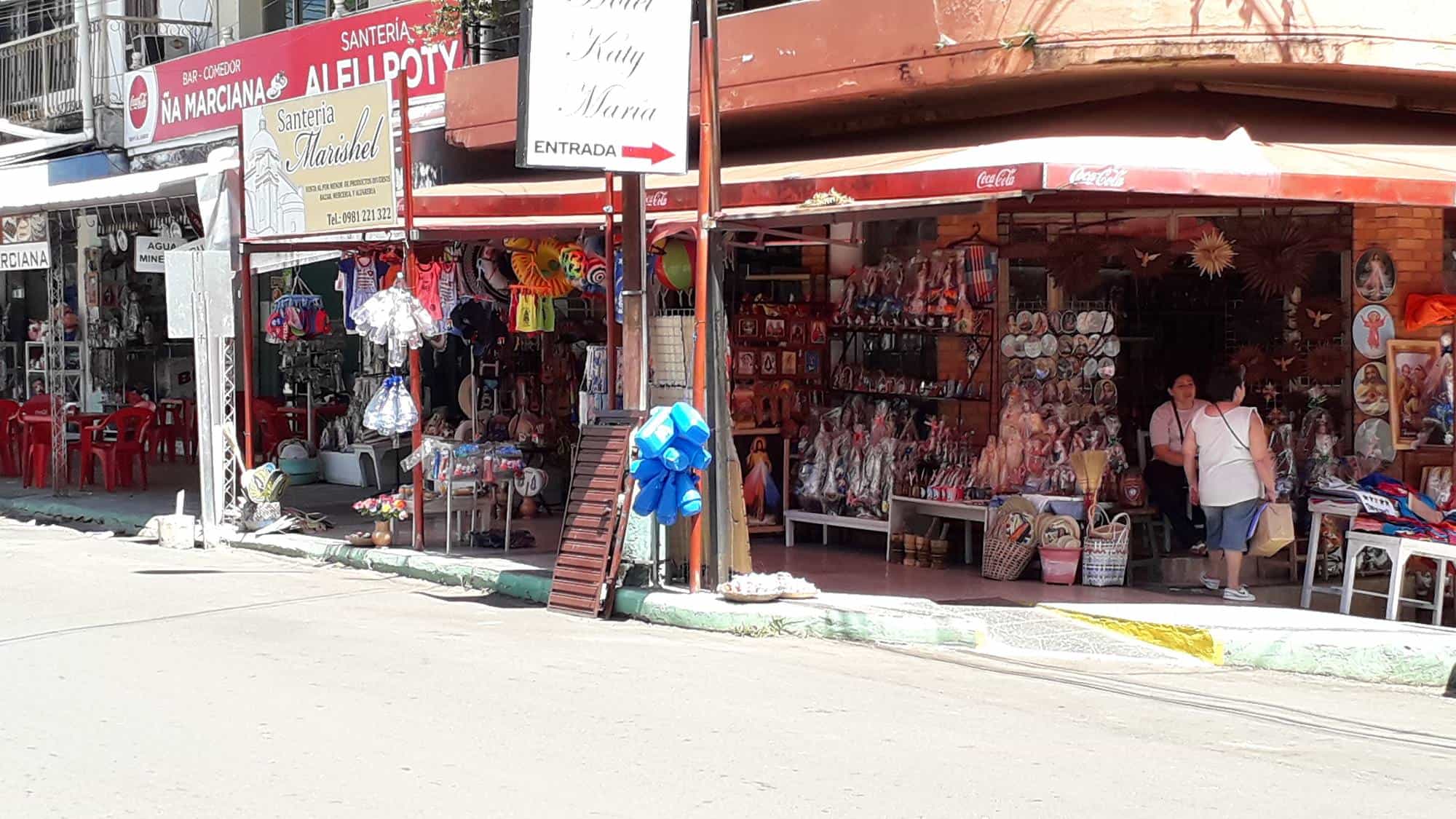 A typical Caacupe street lined with shops and cafes