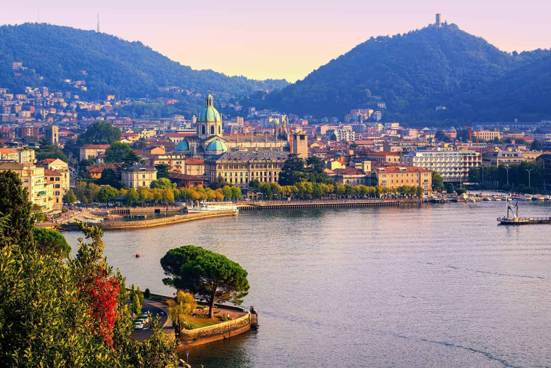 Como City historical town center with the Alps in the background.