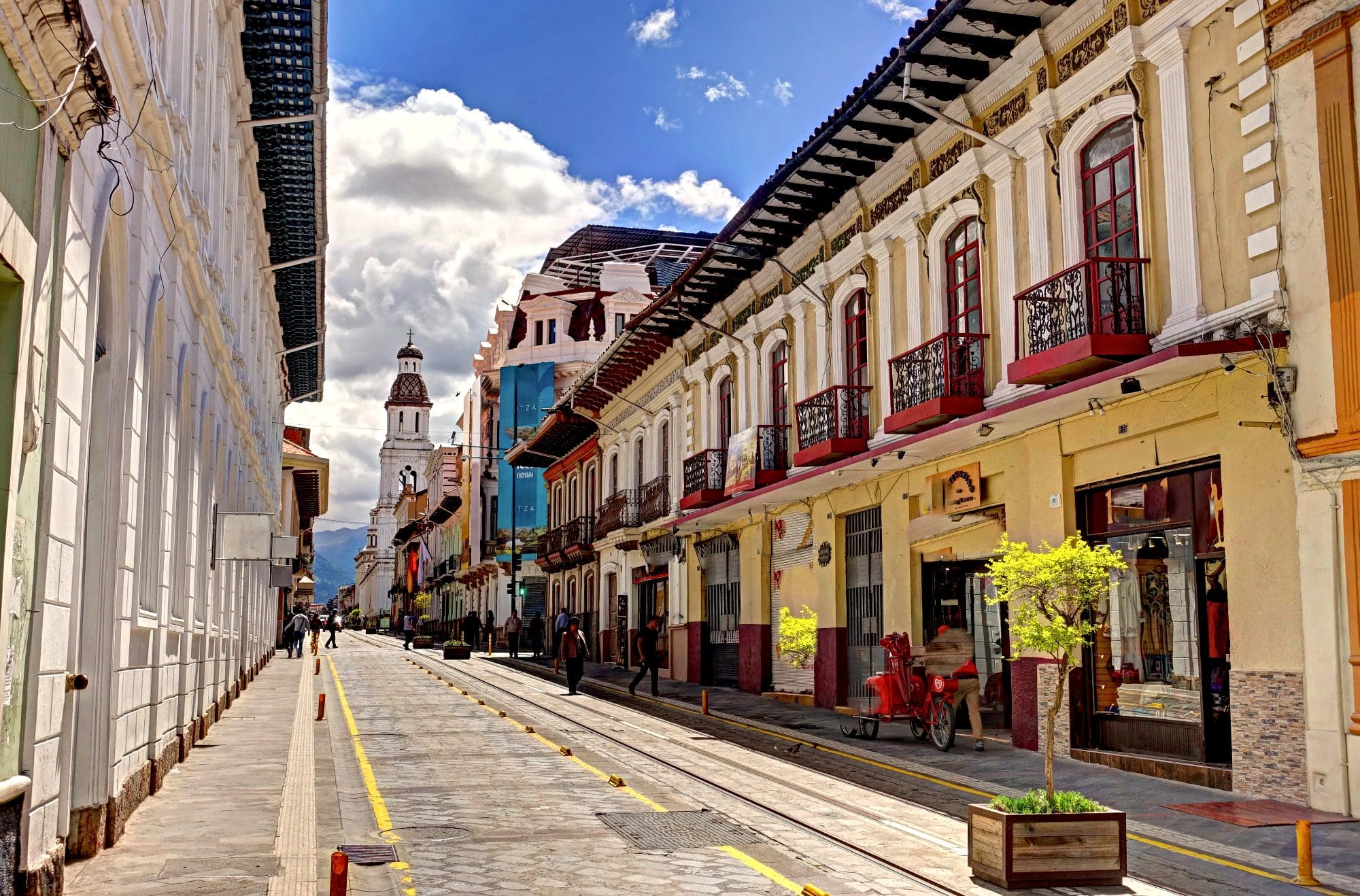 A cobbled street in Cuenca, Ecudor, lined by colonial houses