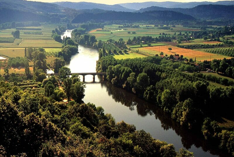 The Dordogne Valley, treelined and stunning in summer.