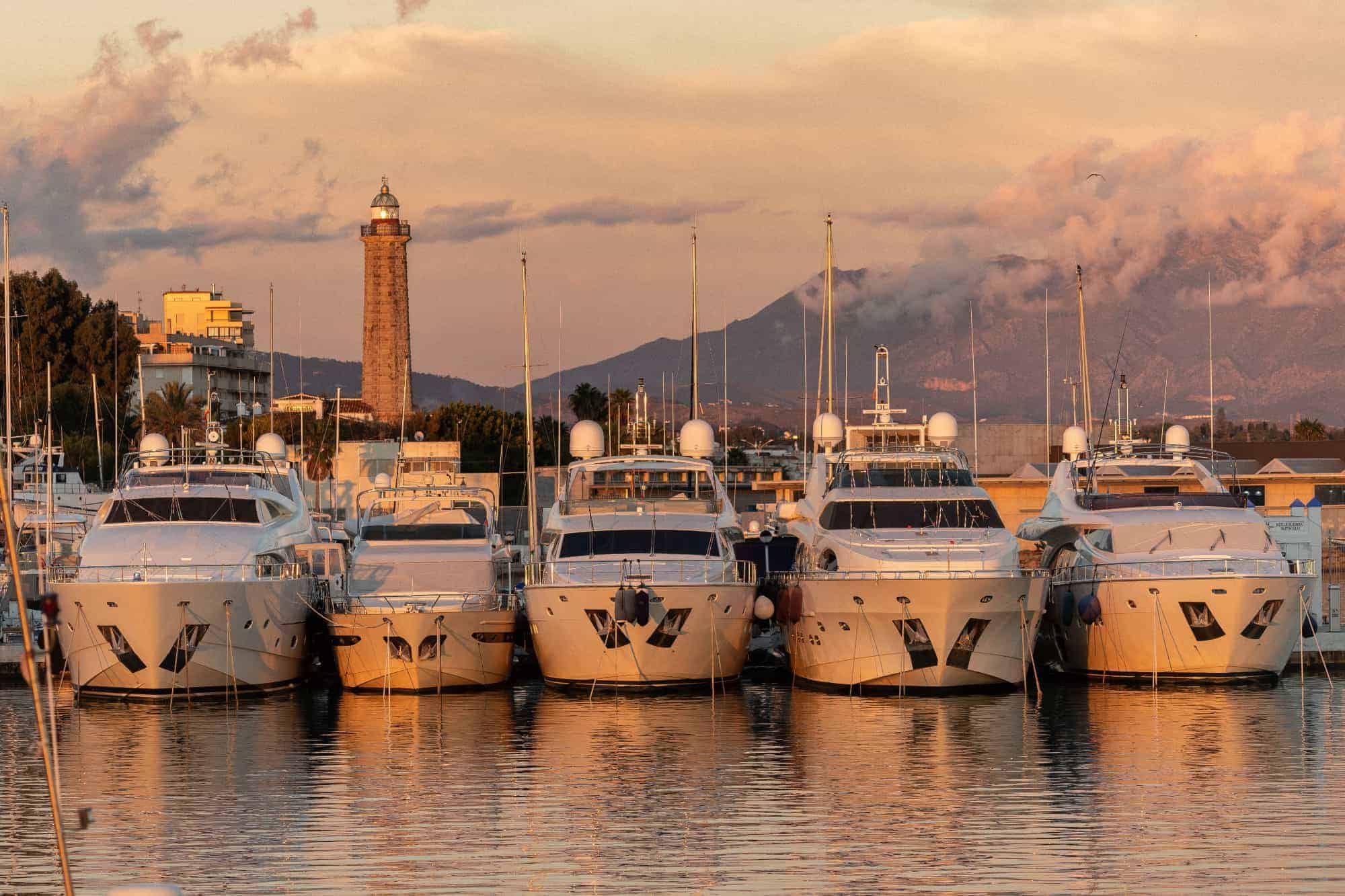 Estepona port - luxury yachts and the mountains in the background