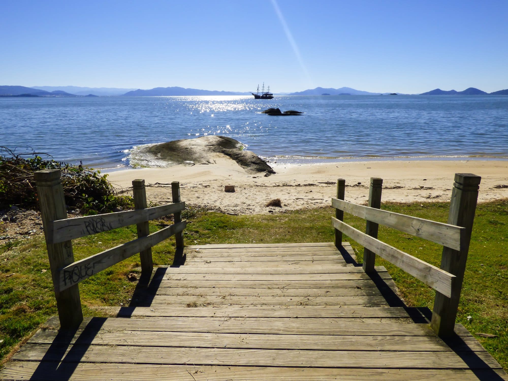 A lush sandy beach in Florianopolis, Brazil
