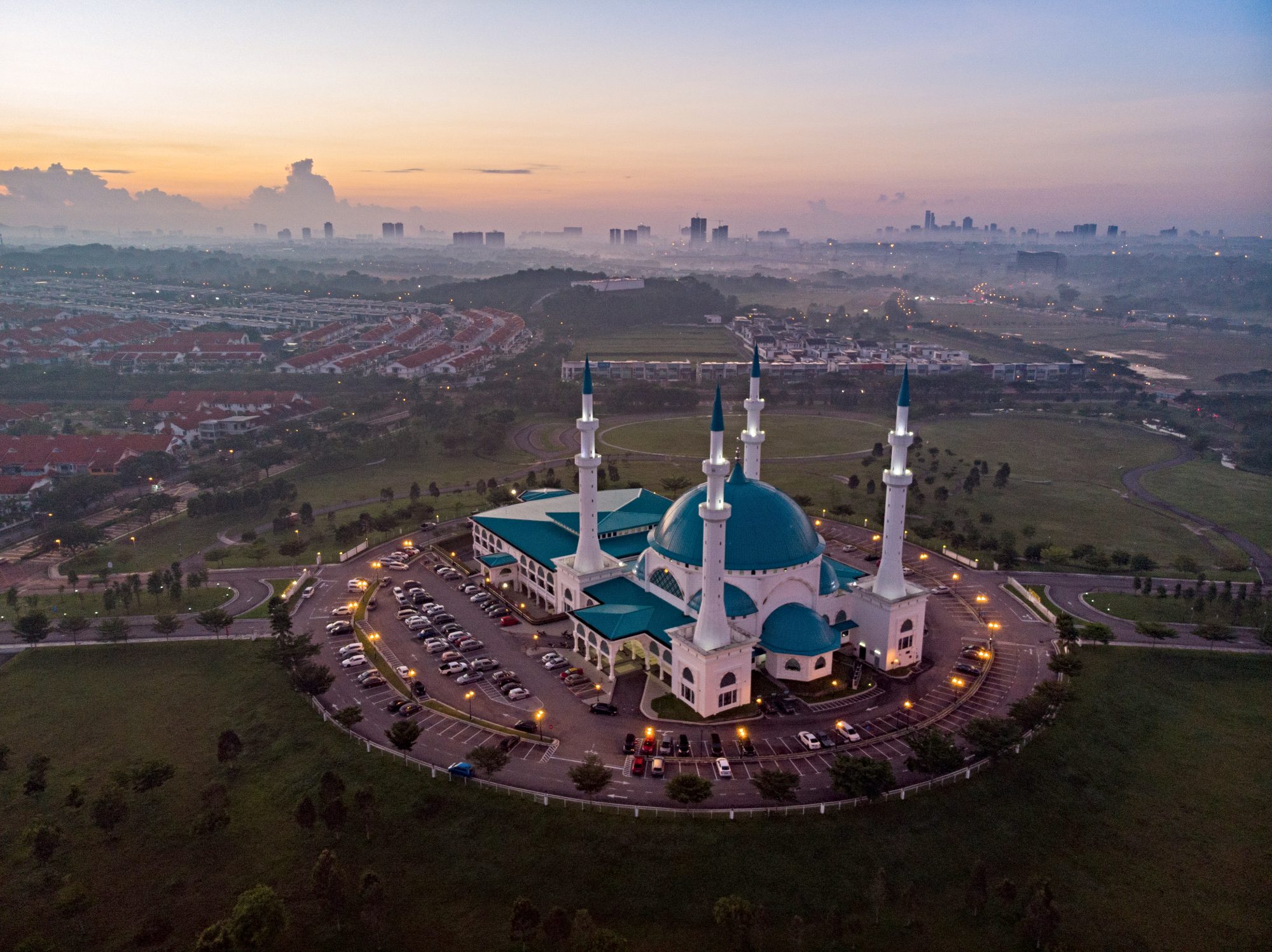 Aerial shot of sunrise over the beautiful mosque at Johor Bahru, Malaysia.