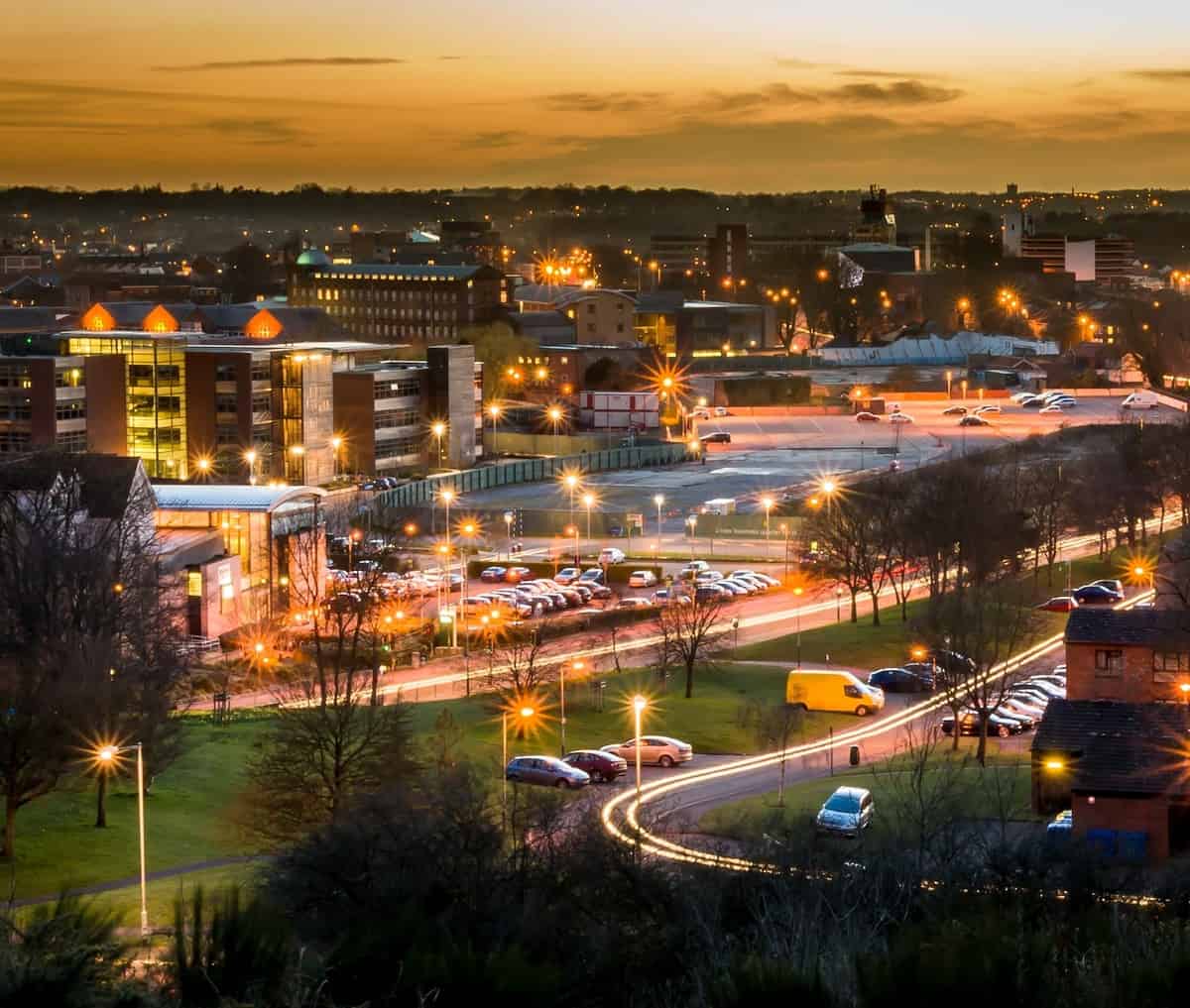 A night view of Norwich, city lights and traffic.