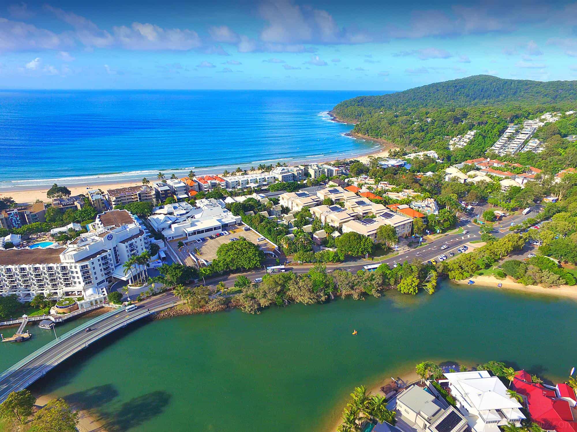 Noosa Heads on the Sunshine Coast - blue waters and sandy beaches and residential areas - view from above.