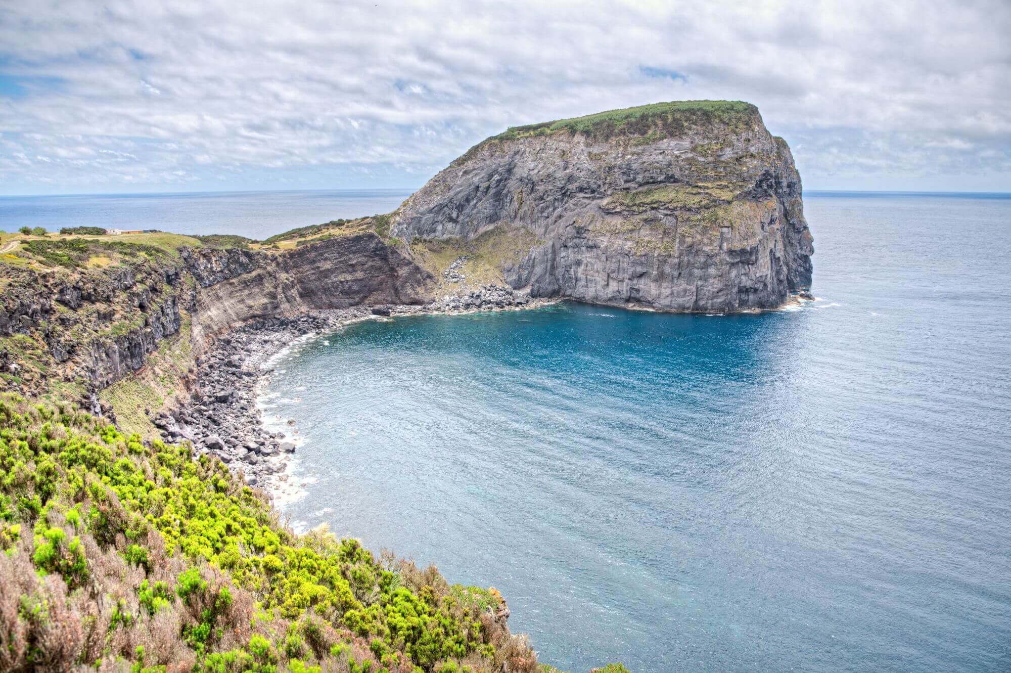 Morro do Castelo Branco, a scenic old rock overlooking the sea on the Faial Island