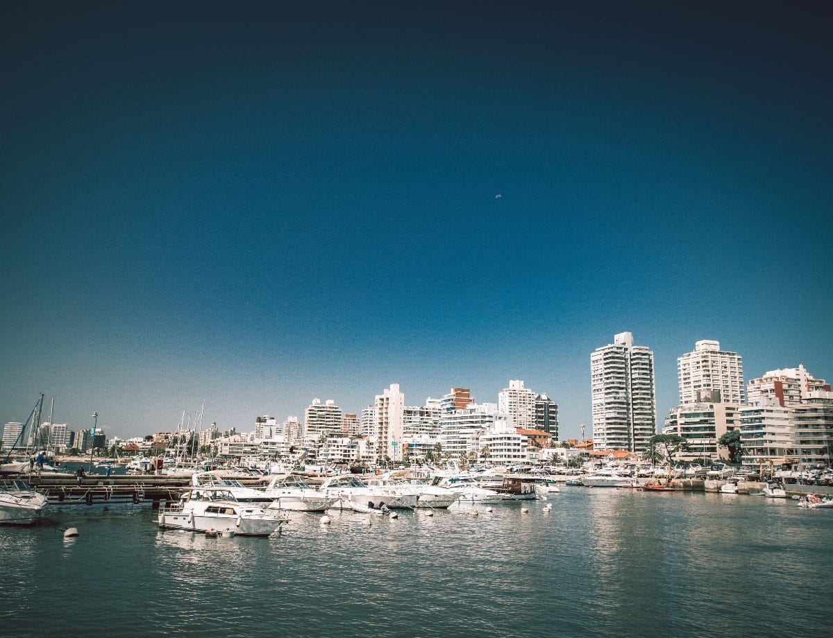 A view across the bay at Punto del Este coast with tall buildings and a marina