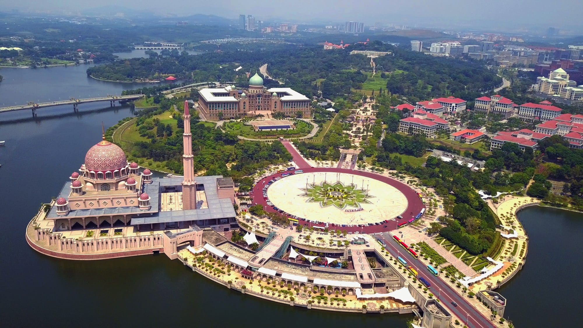 Aerial view of Putra mosque with garden landscape design and Putrajaya Lake, Putrajaya.