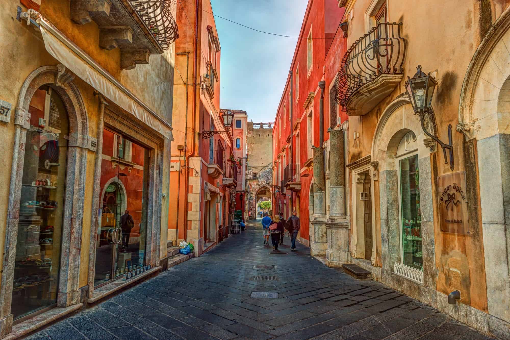A hilltop town and the narrow old streets in Taormina