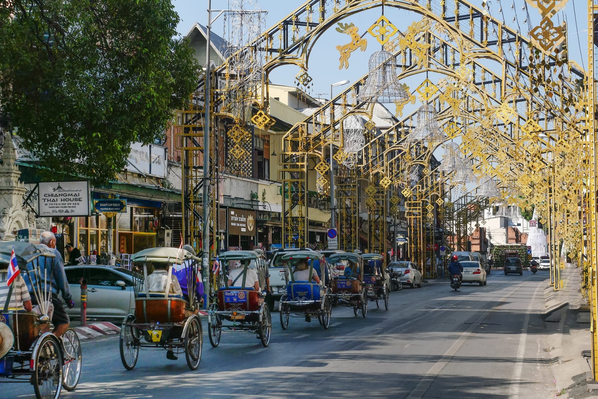 Tricycle taxies on Tha Phae Street in Chiang Mai, Thailand
